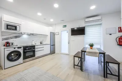 Una cocina o zona de cocina en Modern Space for Your Madrid Stay