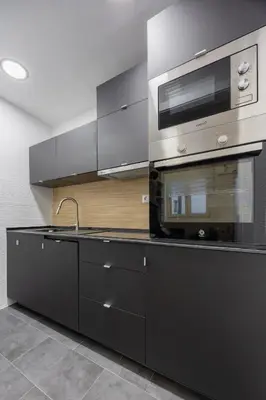Una cocina o zona de cocina en Suites Toro La Latina -AH