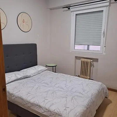 Cama o camas de una habitación en Avenida de America Suite Terrace