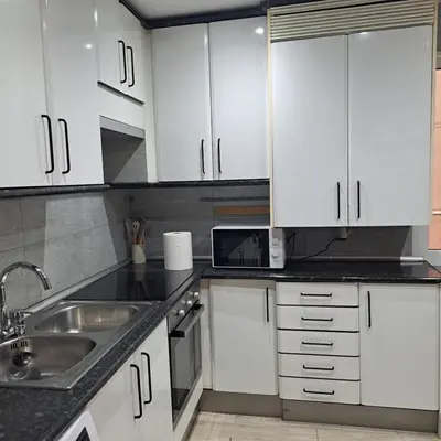 Una cocina o zona de cocina en Avenida de America Suite Terrace