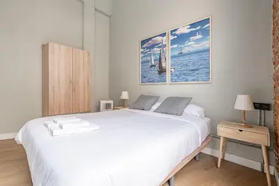 Cama o camas de una habitación en Bonito apartamento Prosperidad