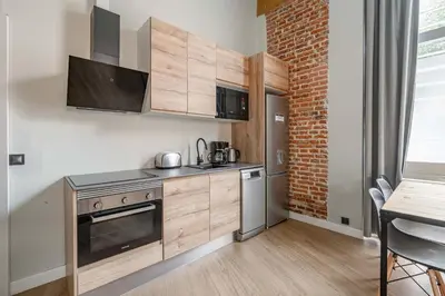 Una cocina o zona de cocina en Bonito apartamento Prosperidad
