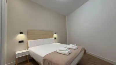 Cama o camas de una habitación en Comfort in the financial heart of Madrid - María Panes