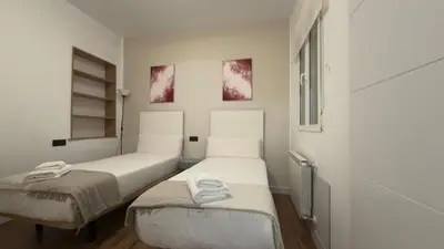 Cama o camas de una habitación en Comfort in the financial heart of Madrid - María Panes
