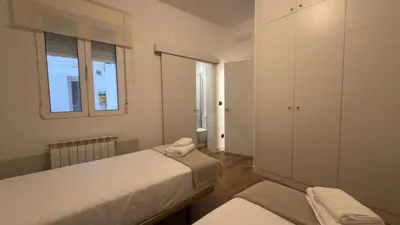 Cama o camas de una habitación en Comfort in the financial heart of Madrid - María Panes