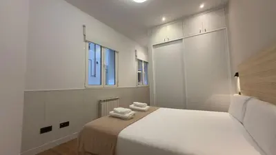 Cama o camas de una habitación en Comfort in the financial heart of Madrid - María Panes