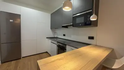 Una cocina o zona de cocina en Comfort in the financial heart of Madrid - María Panes