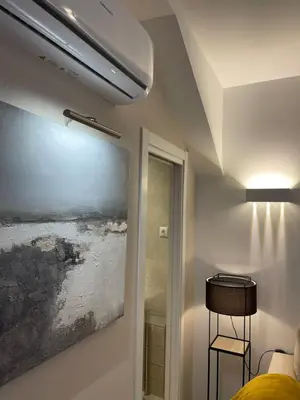 Una televisión o centro de entretenimiento en New Apartment Centro