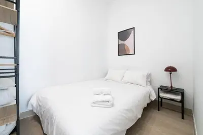 Cama o camas de una habitación en ST17 Apartamento T1 Chamberí