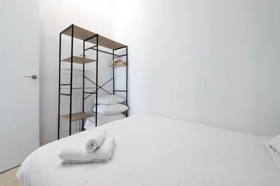 Cama o camas de una habitación en ST17 Apartamento T1 Chamberí