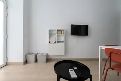 Una televisión o centro de entretenimiento en ST17 Apartamento T1 Chamberí