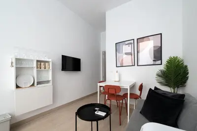 Una televisión o centro de entretenimiento en ST17 Apartamento T1 Chamberí