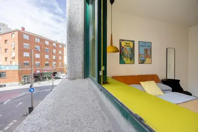 Cama o camas de una habitación en Yellow - Gran Vía Mostenses