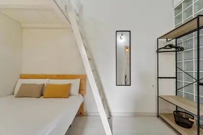 Cama o camas de una habitación en Alojamiento Temporal Zona Imperial Madrid