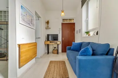 Una televisión o centro de entretenimiento en Alojamiento Temporal Zona Imperial Madrid