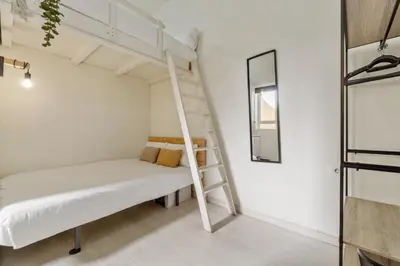 Cama o camas de una habitación en Alojamiento Temporal Zona Imperial Madrid