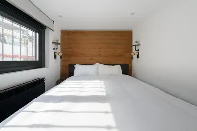 Cama o camas de una habitación en Alojamiento temporal en plaza Santa Ana