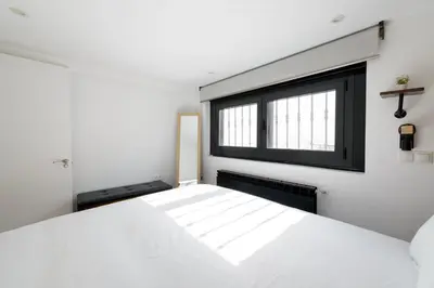 Cama o camas de una habitación en Alojamiento temporal en plaza Santa Ana