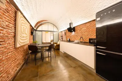 Una cocina o zona de cocina en Elegante piso de dos dormitorios en el corazón de Malasaña, Madrid Temporal DFE11SI
