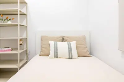 Cama o camas de una habitación en Madrid Tortosa Hub
