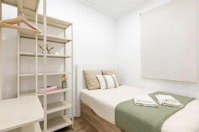 Cama o camas de una habitación en Madrid Tortosa Hub