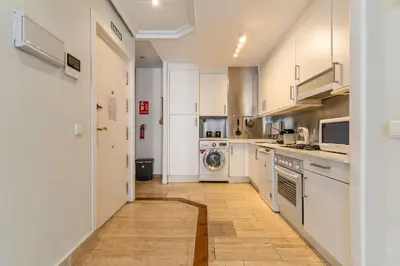 Una cocina o zona de cocina en Modern & Stylish Apt Plz Mayor La Latina