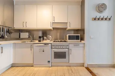 Una cocina o zona de cocina en Modern & Stylish Apt Plz Mayor La Latina