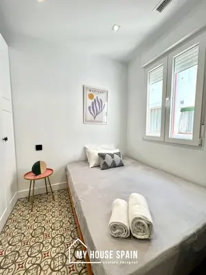 Cama o camas de una habitación en MyHouseSpain - Piso amplio y moderno con terraza