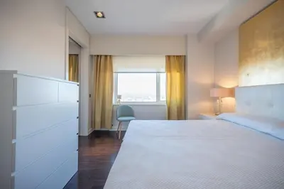 Cama o camas de una habitación en Luxury Plaza España Planta 29 Terraza 360 grados