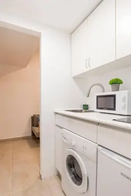 Una cocina o zona de cocina en Cosy apartment Tribunal