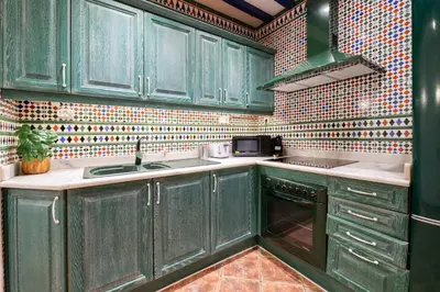 Una cocina o zona de cocina en GuestReady – Stylish Flat in the Heart of Lavapiés