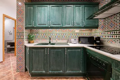 Una cocina o zona de cocina en GuestReady – Stylish Flat in the Heart of Lavapiés