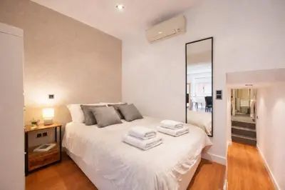 Cama o camas de una habitación en Paseo del Prado Madrid