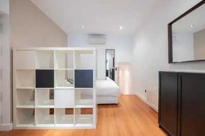 Cama o camas de una habitación en Paseo del Prado Madrid