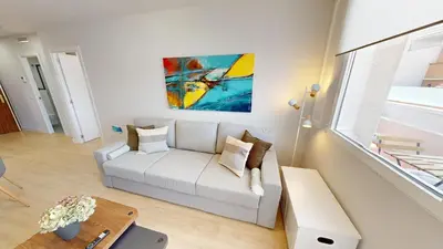 Zona de estar de Stunning penthouse in Cuatro Caminos for 4 pax - Artistas 1