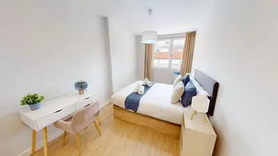 Cama o camas de una habitación en Stunning penthouse in Cuatro Caminos for 4 pax - Artistas 1