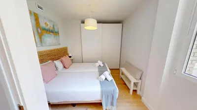 Cama o camas de una habitación en Stunning 2-bedrooms penthouse in Cuatro Caminos - Artistas 2