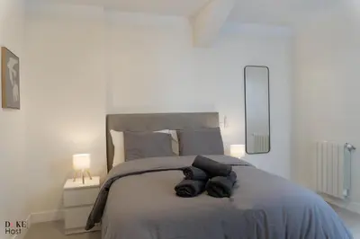 Cama o camas de una habitación en Malasaña Urban Rooms
