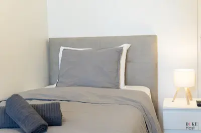 Cama o camas de una habitación en Malasaña Urban Rooms