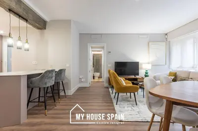 Una televisión o centro de entretenimiento en MyHouseSpain - Elegante y moderno a pasos de Sol