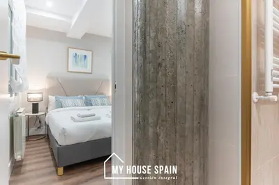 Cama o camas de una habitación en MyHouseSpain - Elegante y moderno a pasos de Sol