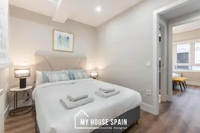 Cama o camas de una habitación en MyHouseSpain - Elegante y moderno a pasos de Sol