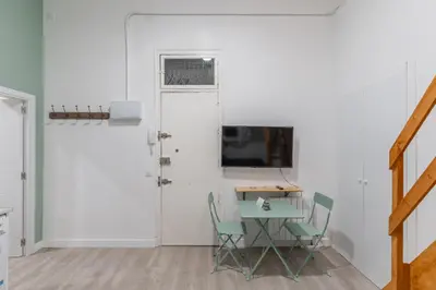 Una televisión o centro de entretenimiento en Central cozy - 1Bedroom 1Bathroom -Gran Vía