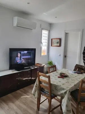 Una televisión o centro de entretenimiento en Vive en Madrid, plaza de Atocha