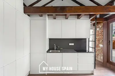 Una cocina o zona de cocina en MyHouseSpain - Increíble piso con terraza