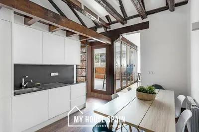 Una cocina o zona de cocina en MyHouseSpain - Increíble piso con terraza