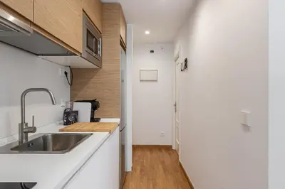 Una cocina o zona de cocina en Waou Urban Home Gran Via I - Corta Duración