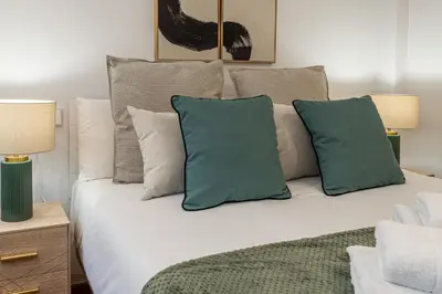 Cama o camas de una habitación en Waou Urban Home Gran Via I - Corta Duración