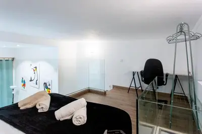 Cama o camas de una habitación en Industrial style duplex apartment