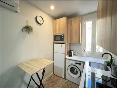 Una cocina o zona de cocina en Acogedor apartamento centro de Madrid